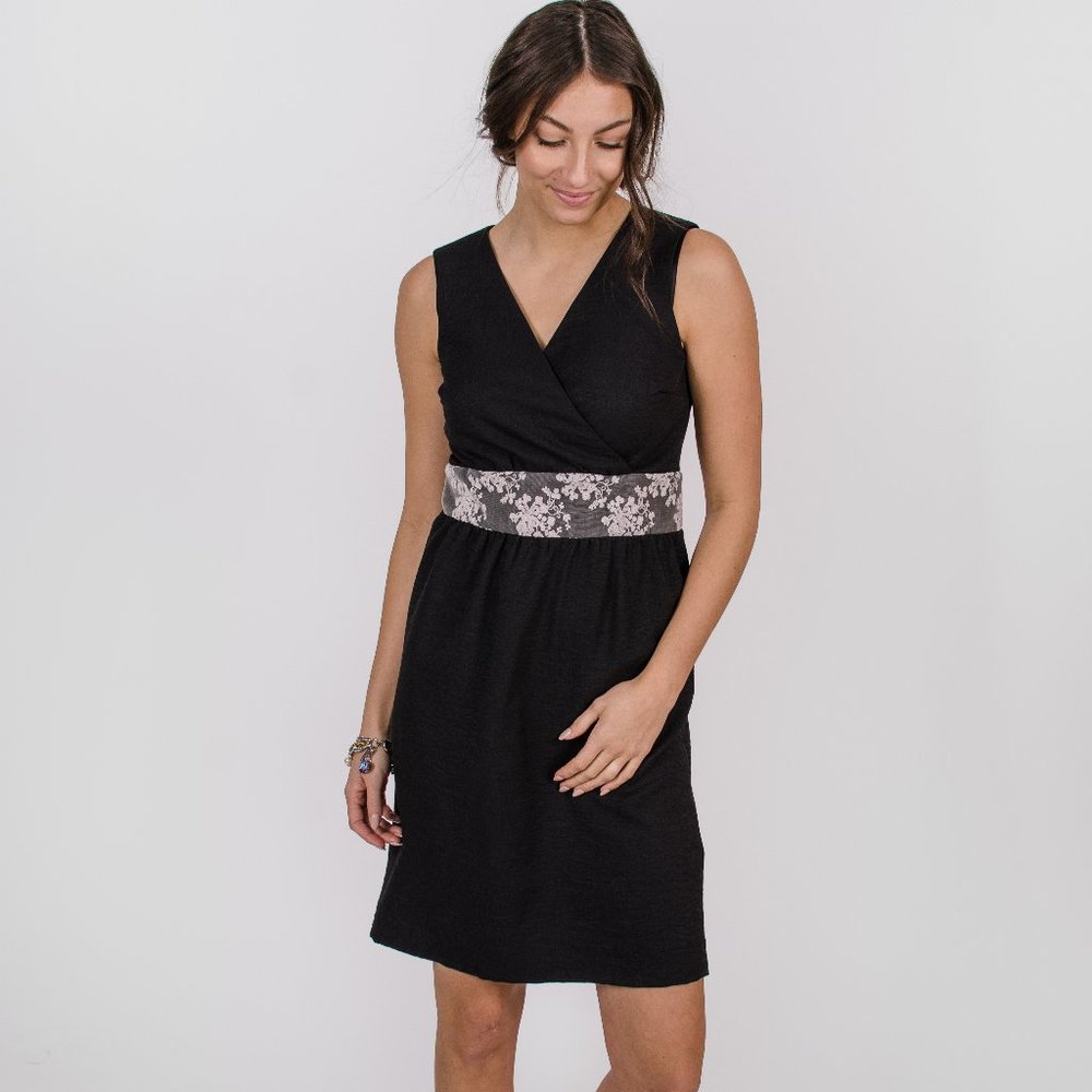 Black sleeveless dress with lace midi length